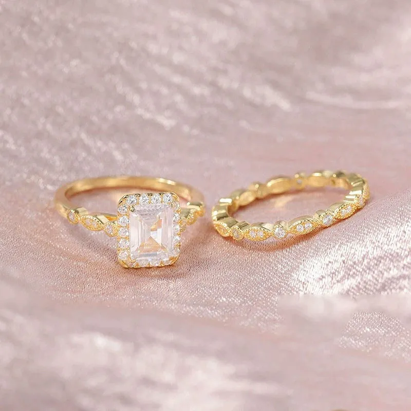 925 sterling silver ring with rectangular zircon inlay in gold finish on white background
