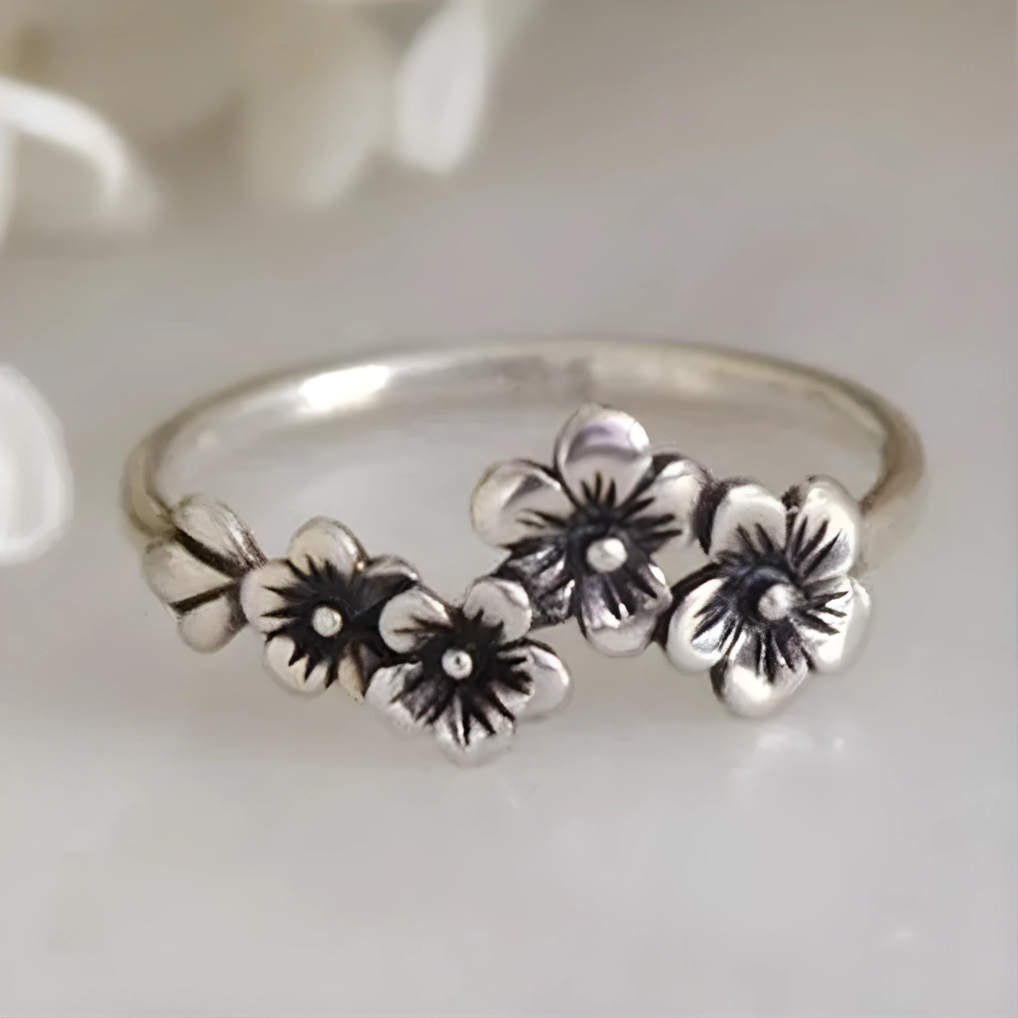 Antique silver alloy geometric ring with retro personality style on white background