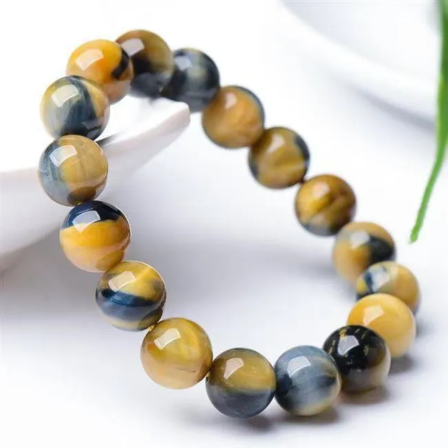 Handmade fantasy tiger eye agate bracelet with geometric round beads in natural stone patterns