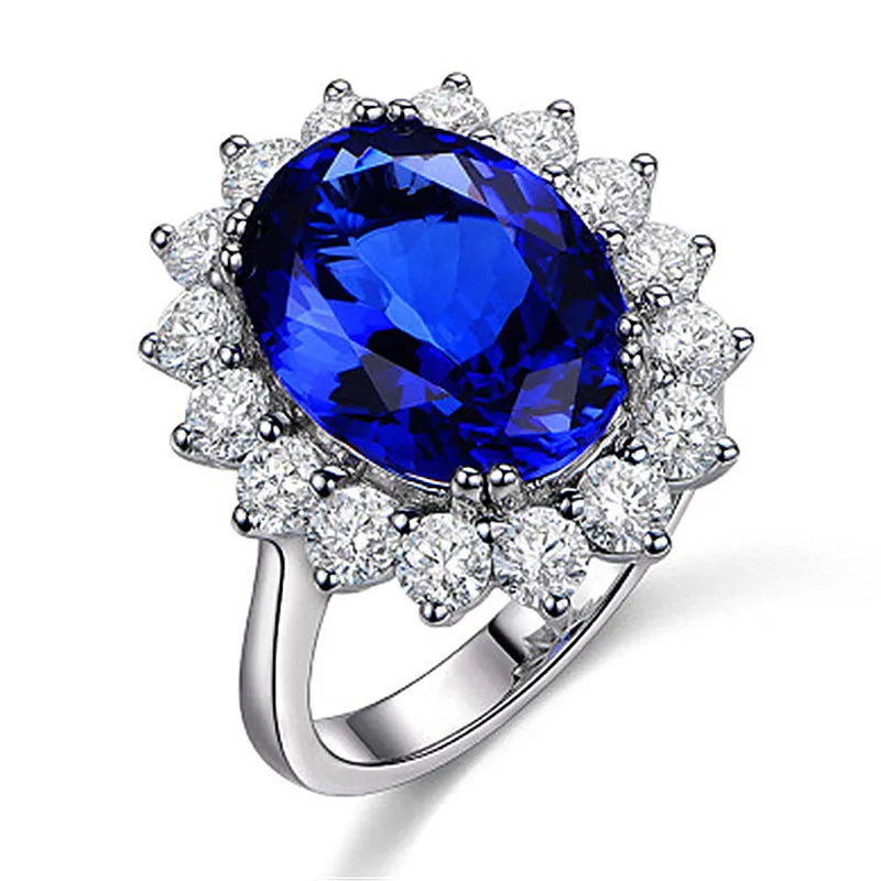 Adjustable opening rhinestone ring in platinum colour with geometric design on white background