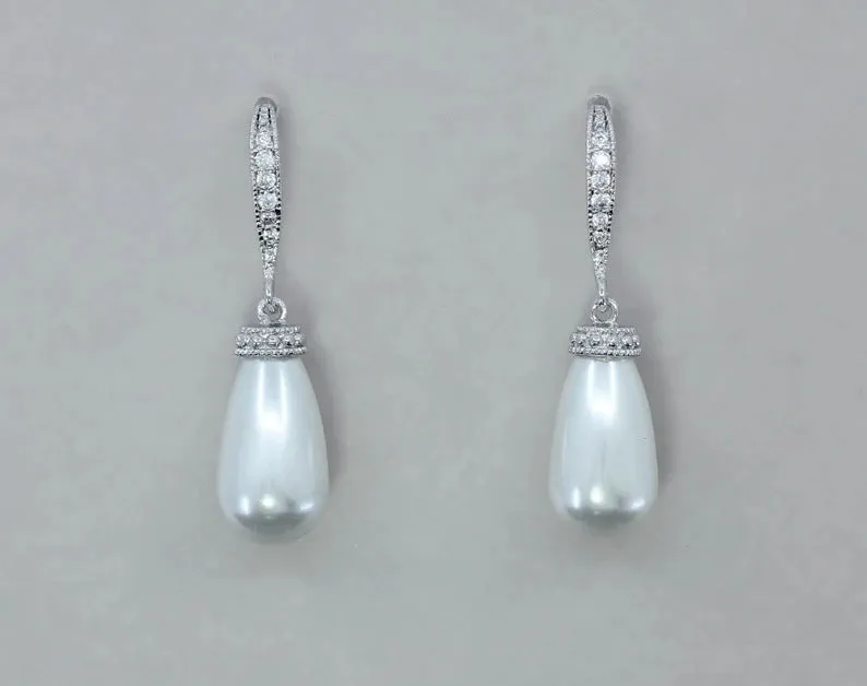 Silver alloy drop earrings with fully-inlaid artificial freshwater pearl and shell pearl surface