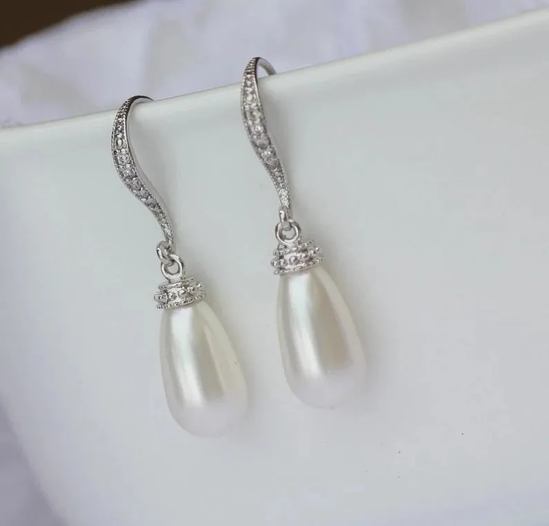 Silver alloy drop earrings with fully-inlaid artificial freshwater pearl and shell pearl surface