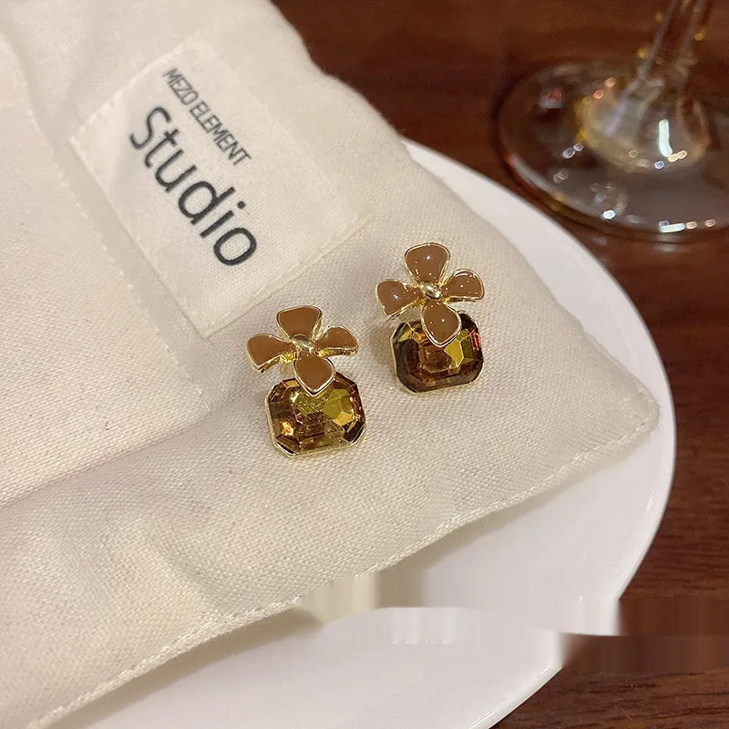 Gold electroplated alloy flower earrings with coffee colour floral motif for women