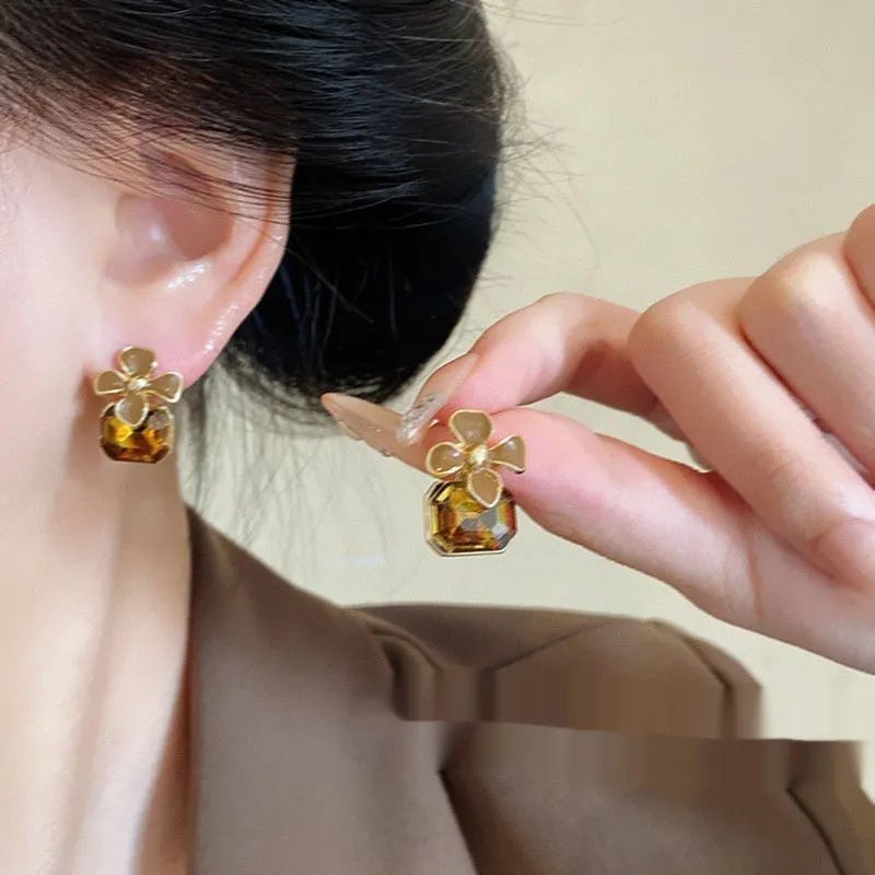 Gold electroplated alloy flower earrings with coffee colour floral motif for women