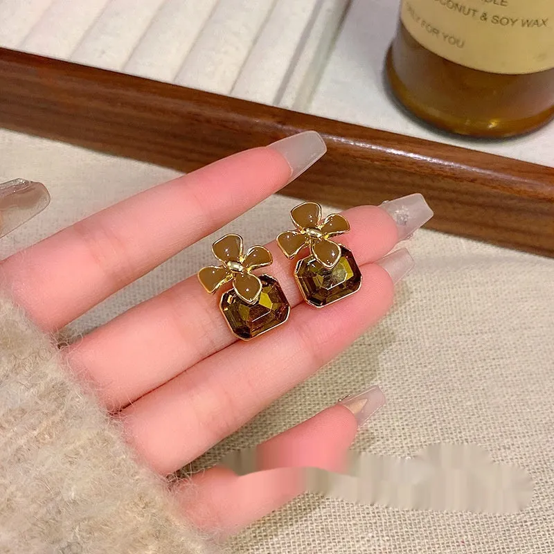 Gold electroplated alloy flower earrings with coffee colour floral motif for women