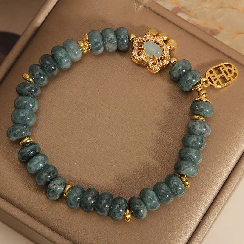 Women's bracelet with emerald jade abacus beads and alloy safety lock clasp