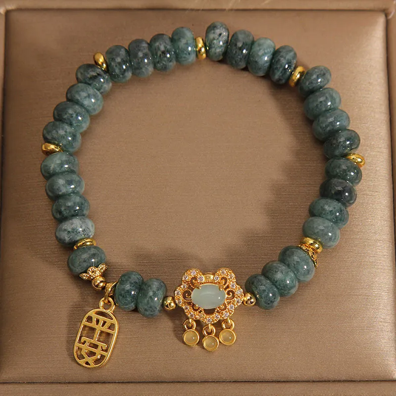 Women's bracelet with emerald jade abacus beads and alloy safety lock clasp