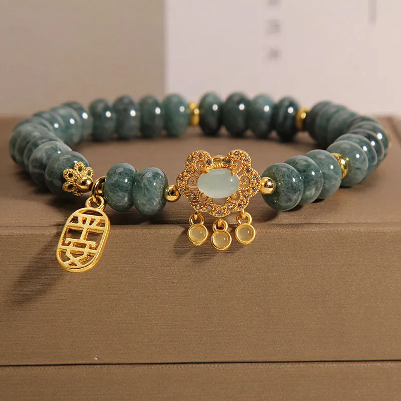 Women's bracelet with emerald jade abacus beads and alloy safety lock clasp