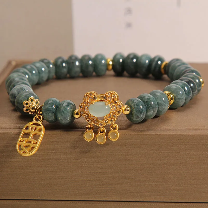 Women's bracelet with emerald jade abacus beads and alloy safety lock clasp