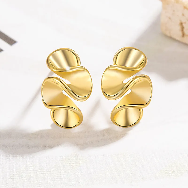 Geometric cream flower stud earrings in gold electroplated finish on copper base with irregular shape