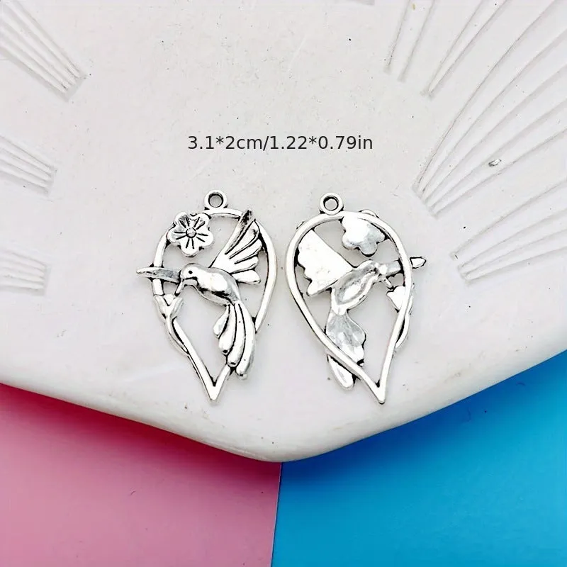 Close-up of a detailed alloy cuckoo bird charm pendant with electroplated finish in colour P234.