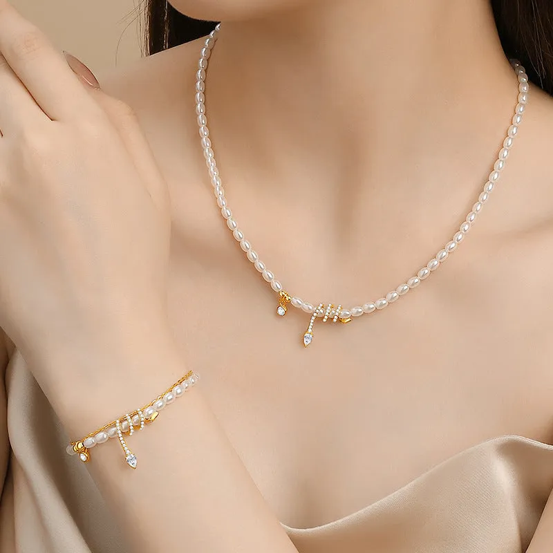 Pearl snake 925 sterling silver bracelet with geometric design in gold or white gold finish.
