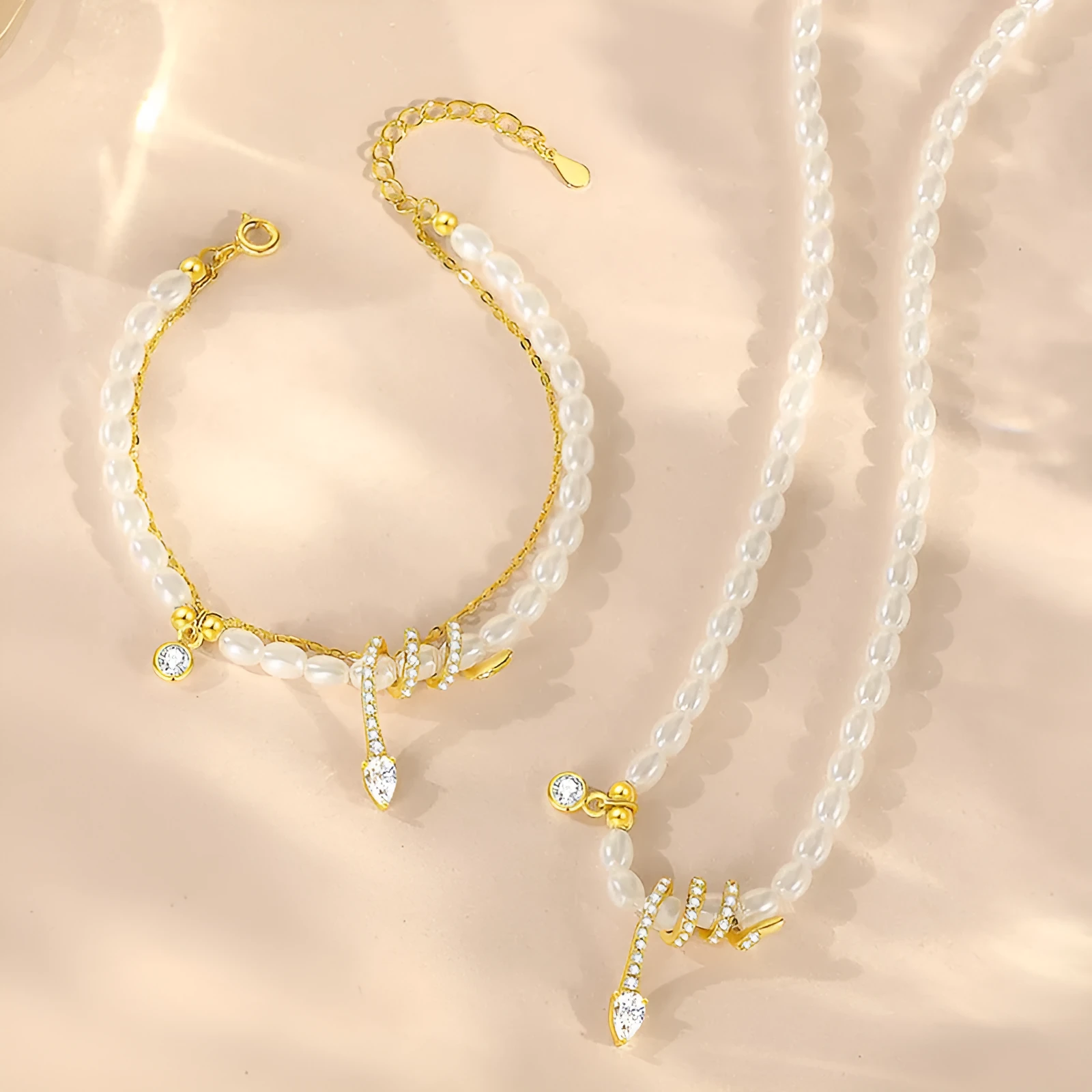 Pearl snake 925 sterling silver bracelet with geometric design in gold or white gold finish.