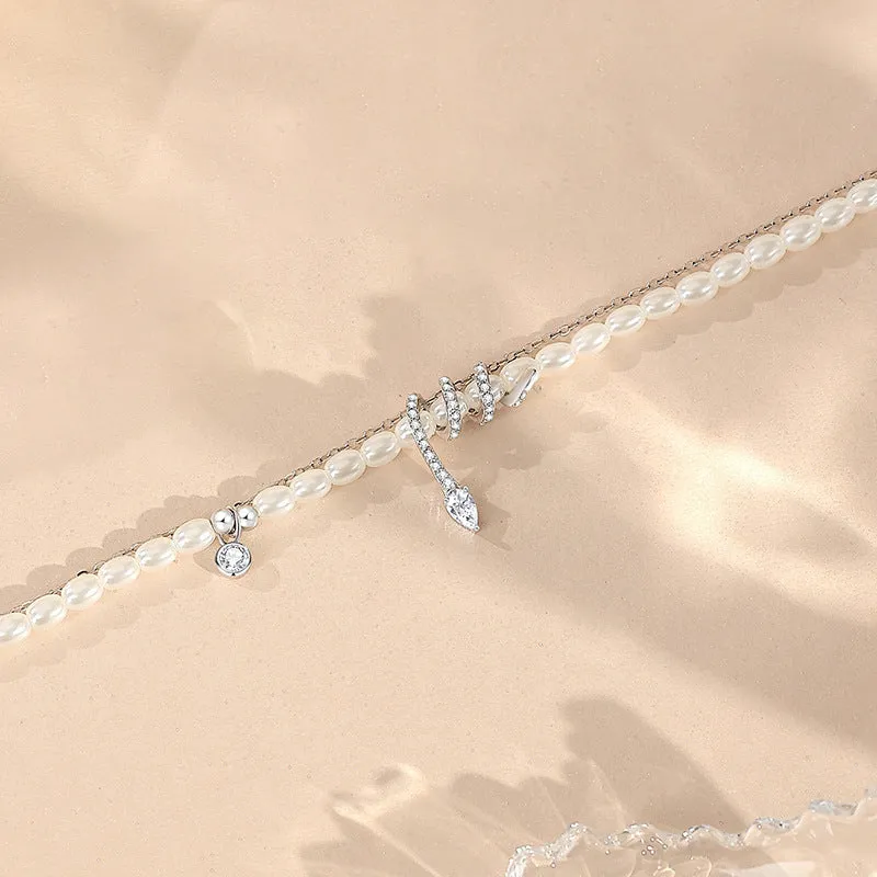 Pearl snake 925 sterling silver bracelet with geometric design in gold or white gold finish.