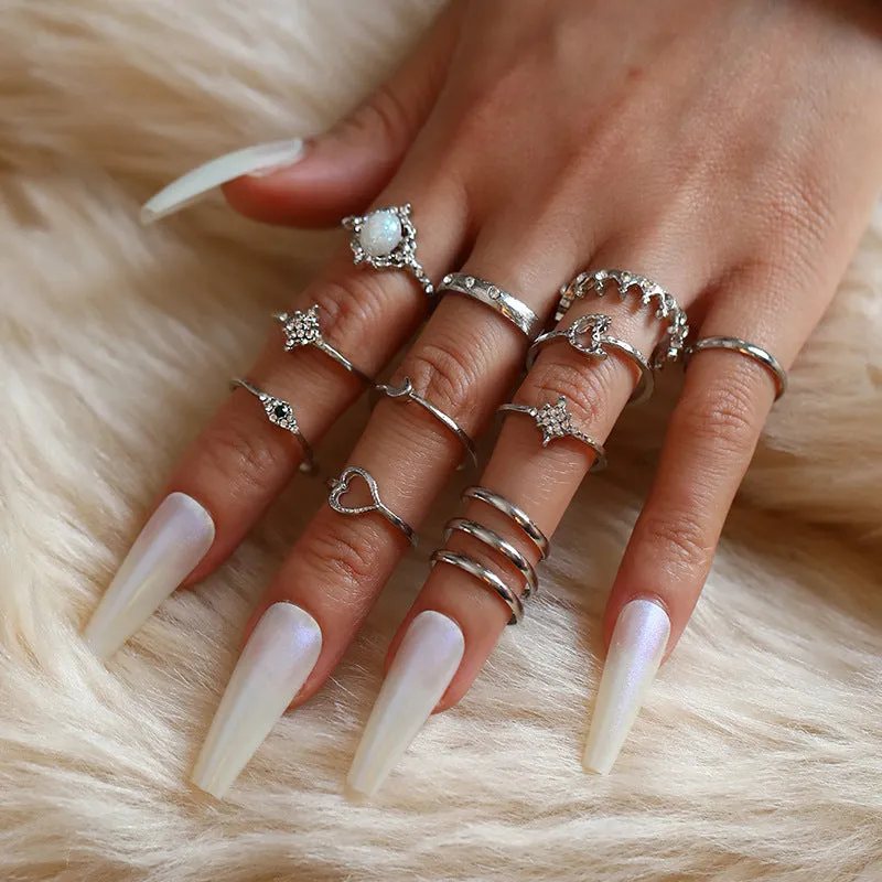 Vintage star moon rhinestone ring set of 13 pieces in gold and silver on display