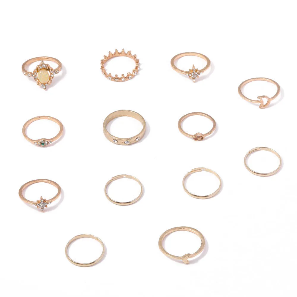 Vintage star moon rhinestone ring set of 13 pieces in gold and silver on display