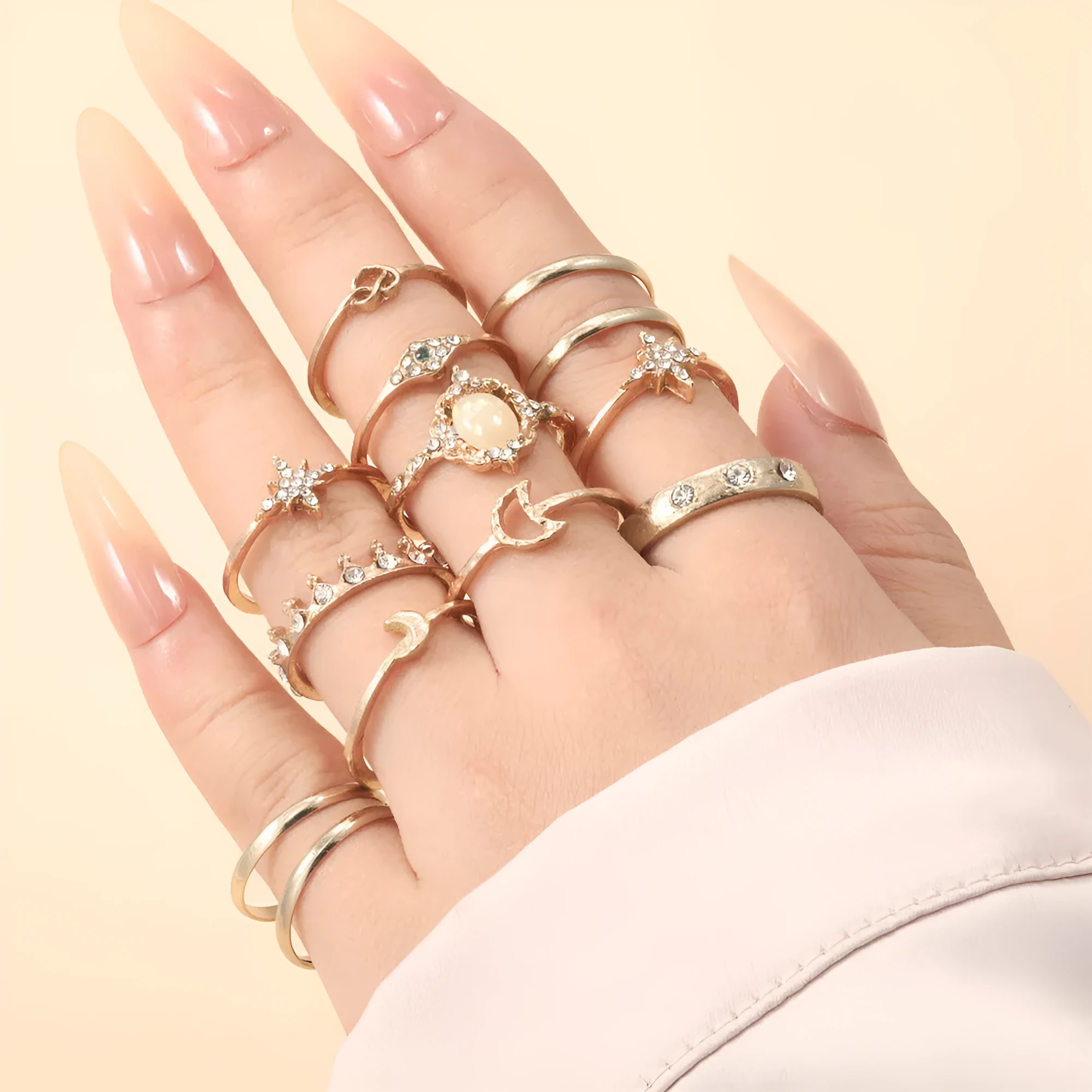 Vintage star moon rhinestone ring set of 13 pieces in gold and silver on display