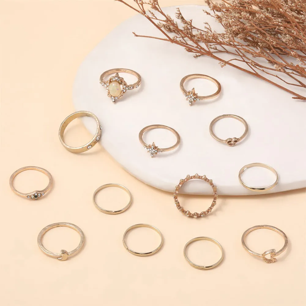 Vintage star moon rhinestone ring set of 13 pieces in gold and silver on display