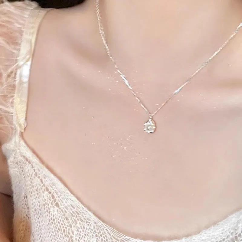 Titanium steel necklace with flower-shaped pearl pendant and adjustable chain