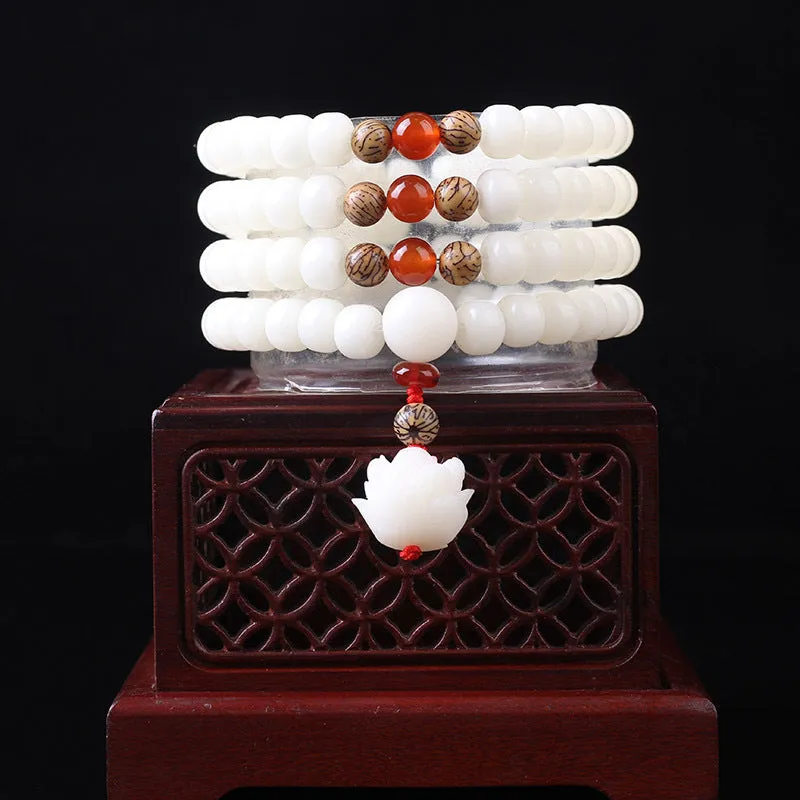 White jade bodhi bead bracelet with 6x8mm beads in traditional styles