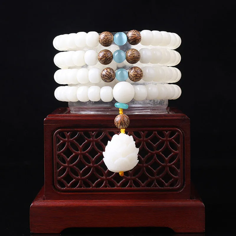 White jade bodhi bead bracelet with 6x8mm beads in traditional styles