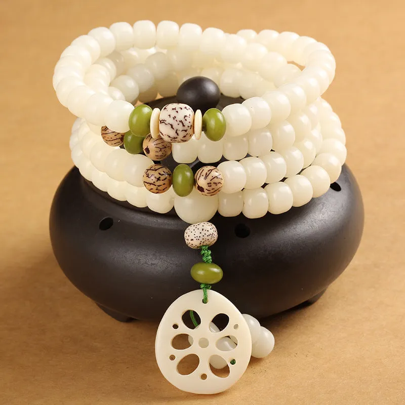 White jade bodhi bead bracelet with 6x8mm beads in traditional styles