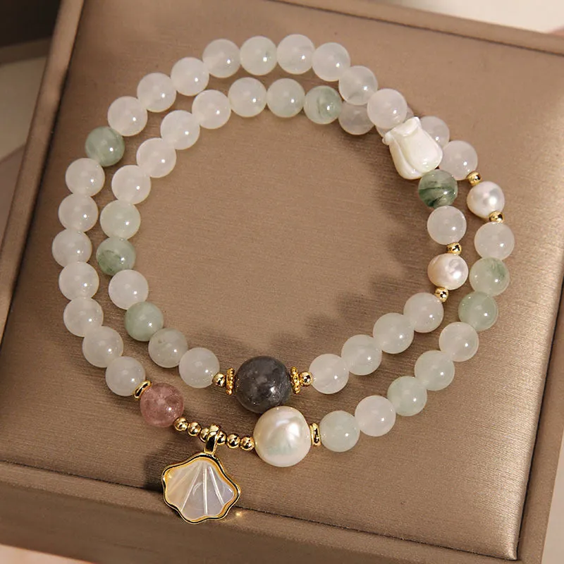 Crystal bracelet with Tianshan jade shell ginkgo leaf pendant and gold-plated gemstone settings