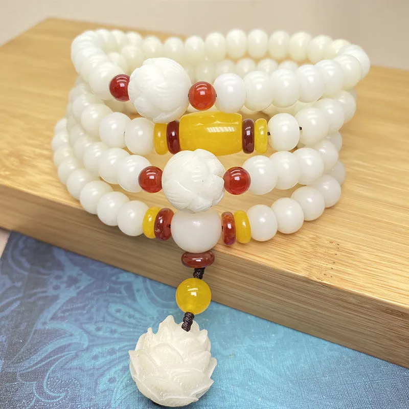 White Jade Bodhi bead bracelet with 108 beads, showing three different carved pattern styles.