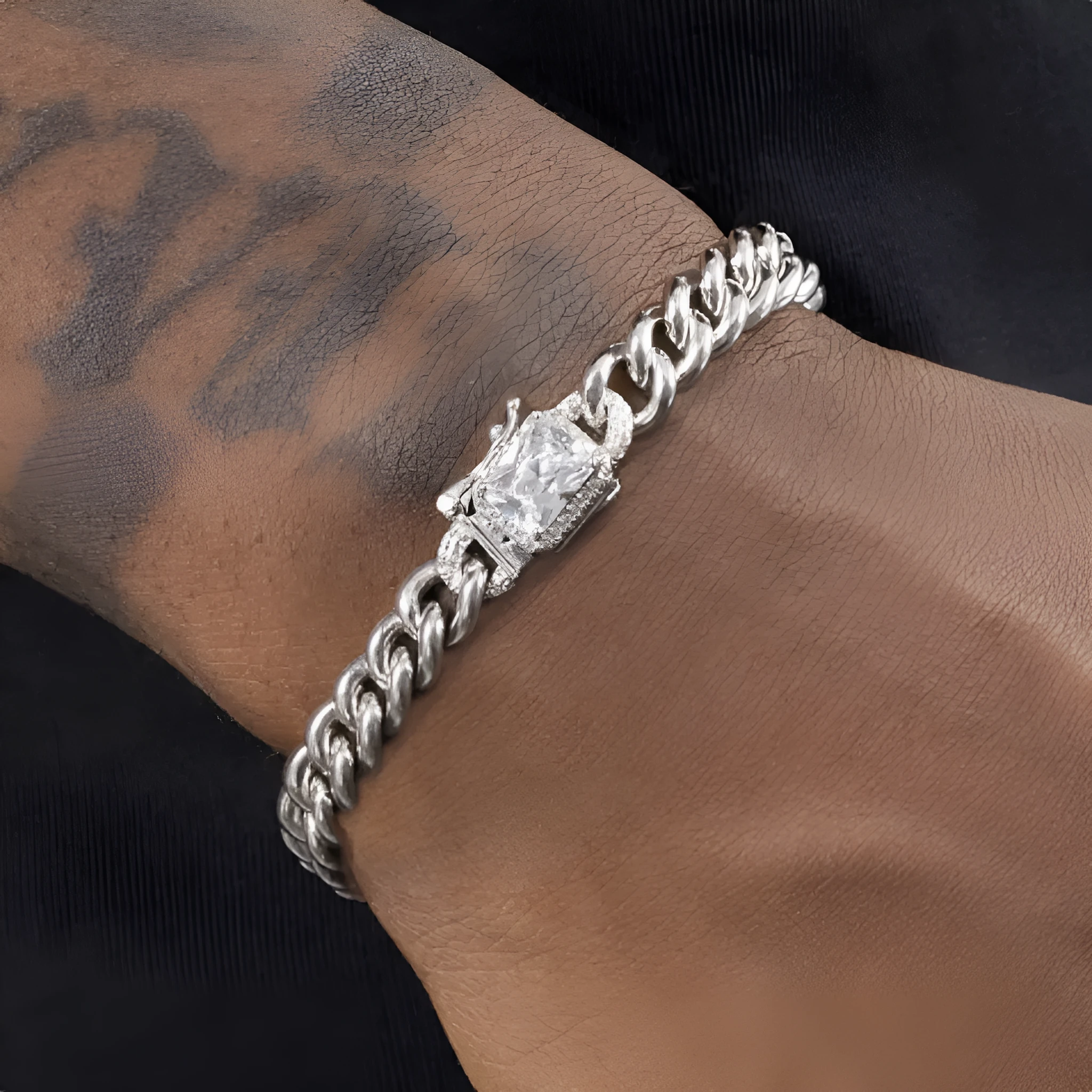 S925 sterling silver Cuban chain bracelet on flat surface showing link detail, 18cm unisex size