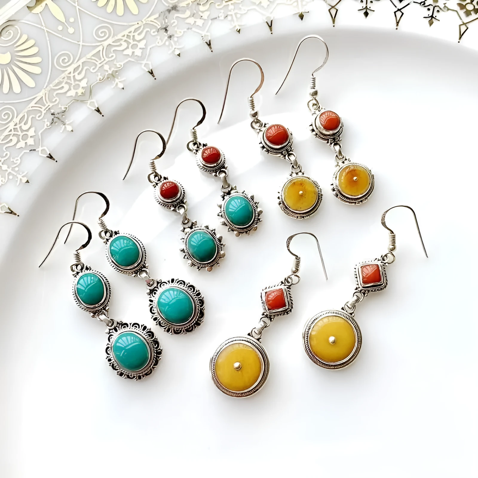 Silver plated geometric ethnic style earrings with chamfered square pattern in turquoise imitation colour