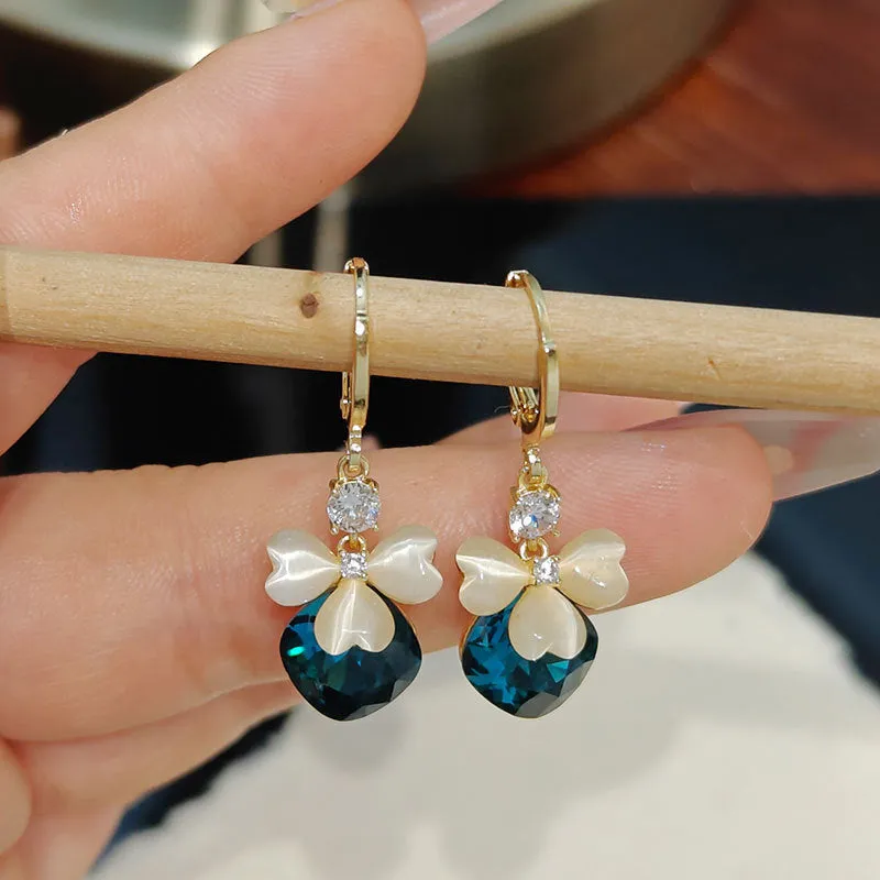 Electroplated blue crystal earrings with bow shape on alloy base