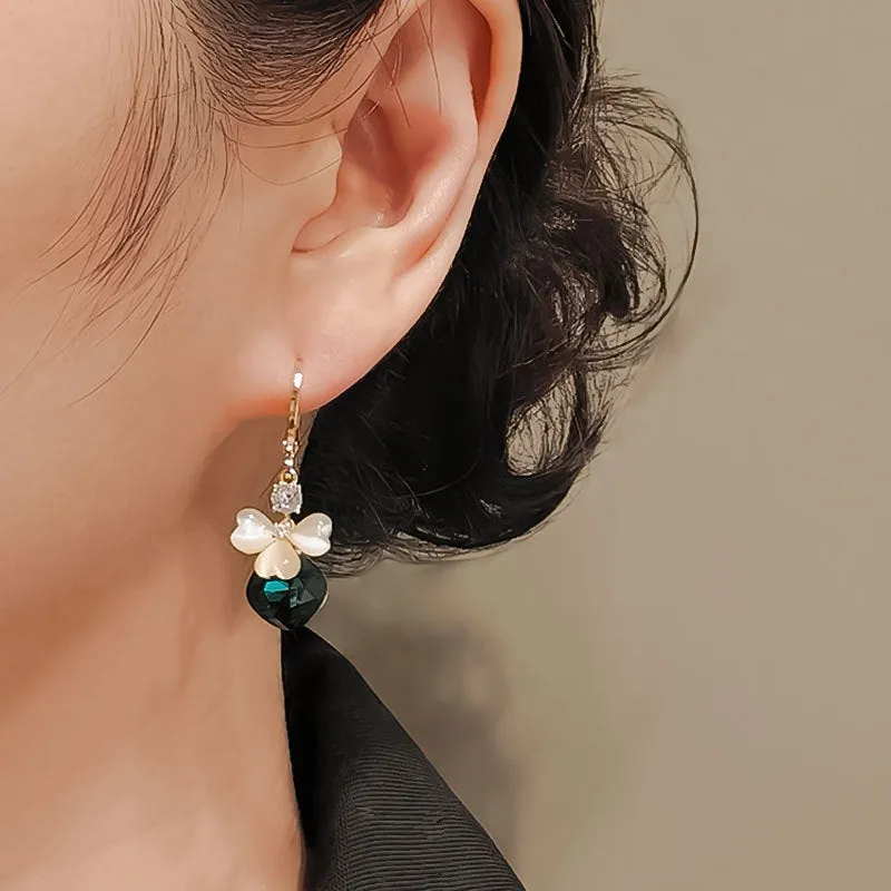 Electroplated blue crystal earrings with bow shape on alloy base