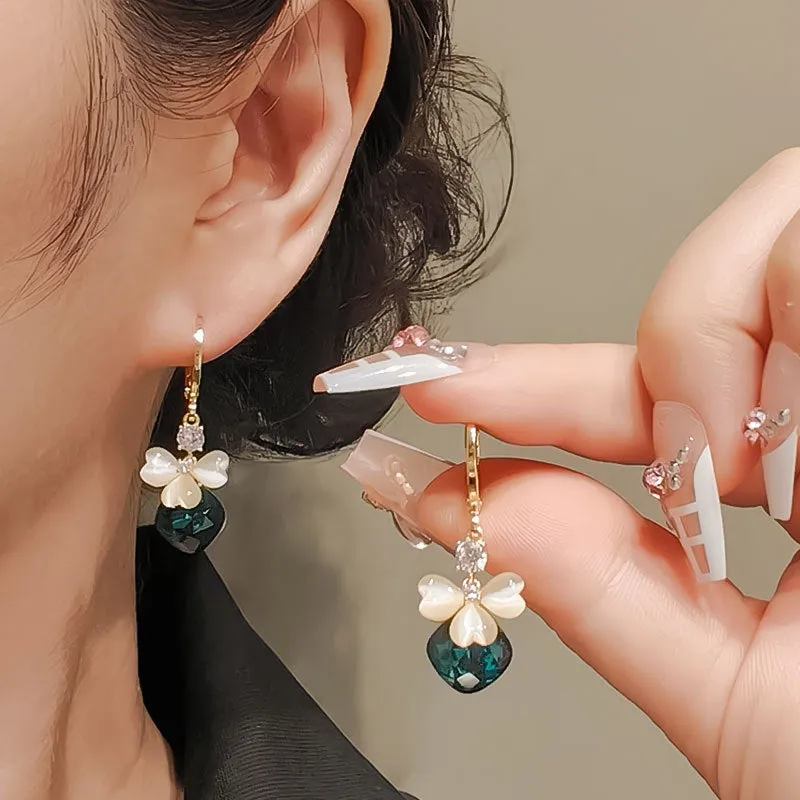 Electroplated blue crystal earrings with bow shape on alloy base