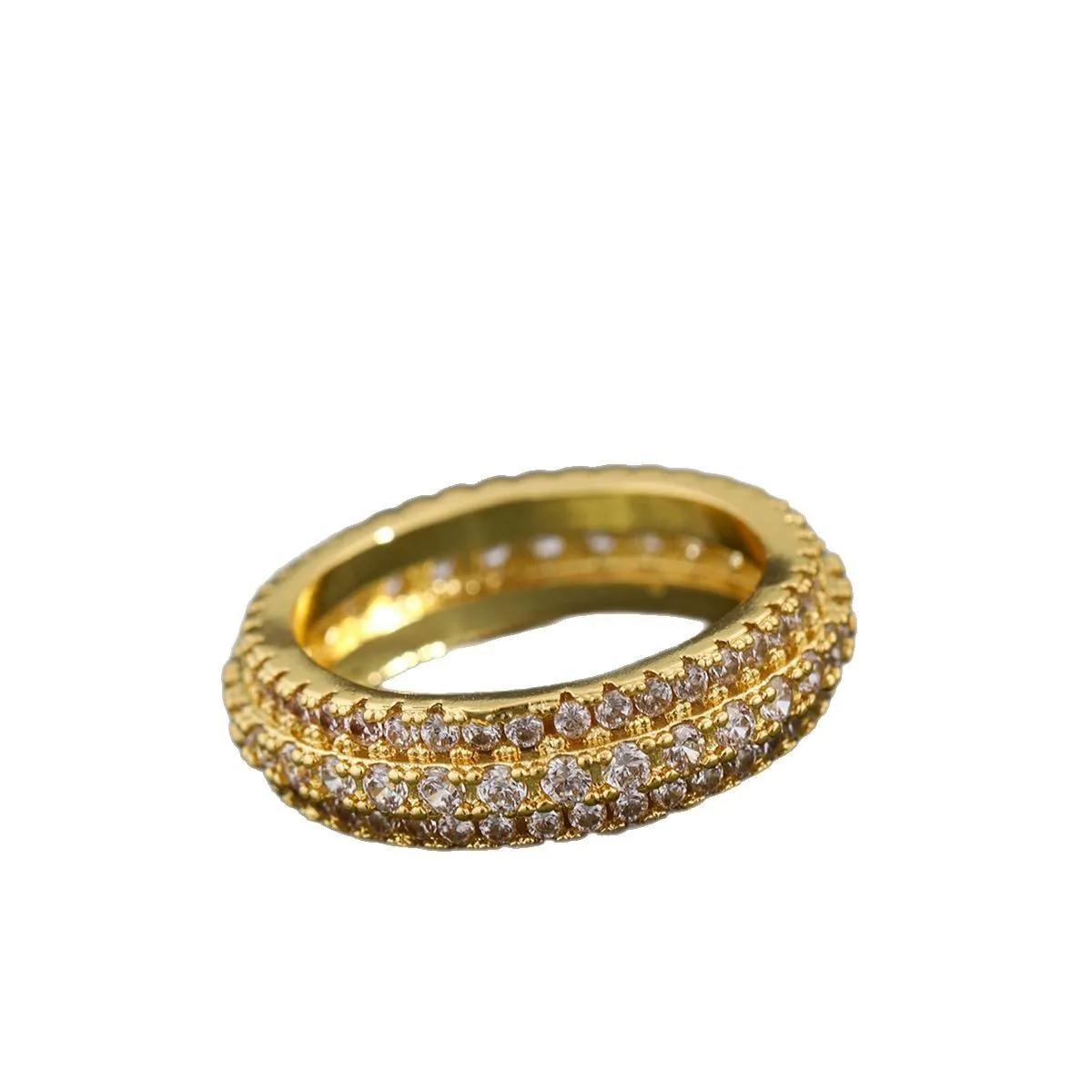 Geometric copper ring with a triangular zircon stone inlay, shown on a finger.