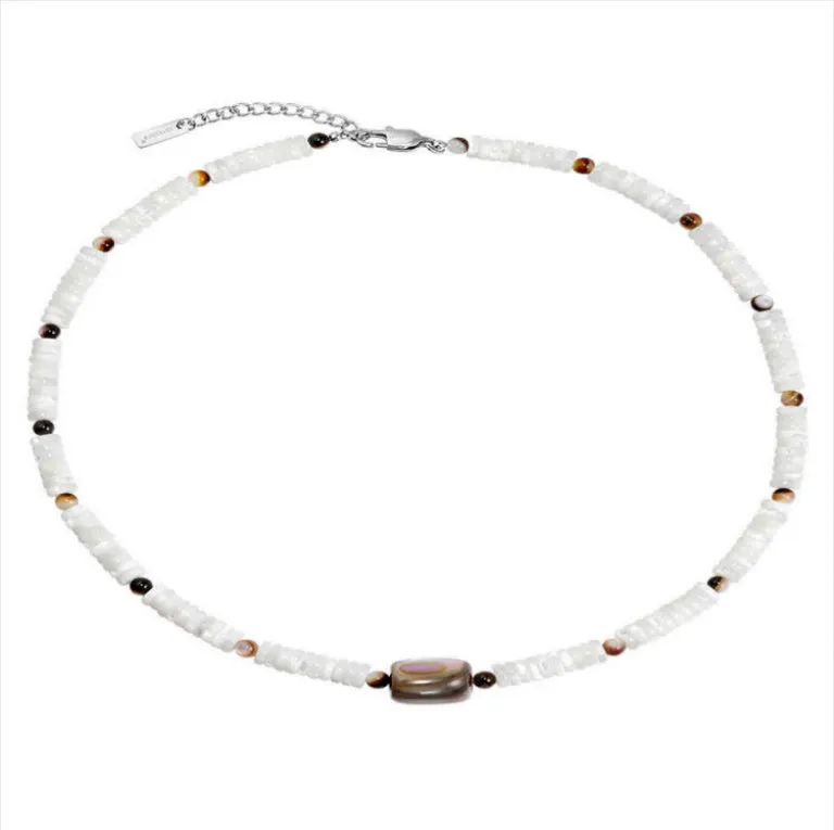 Men's vintage white shell necklace with round bead chain on neutral background