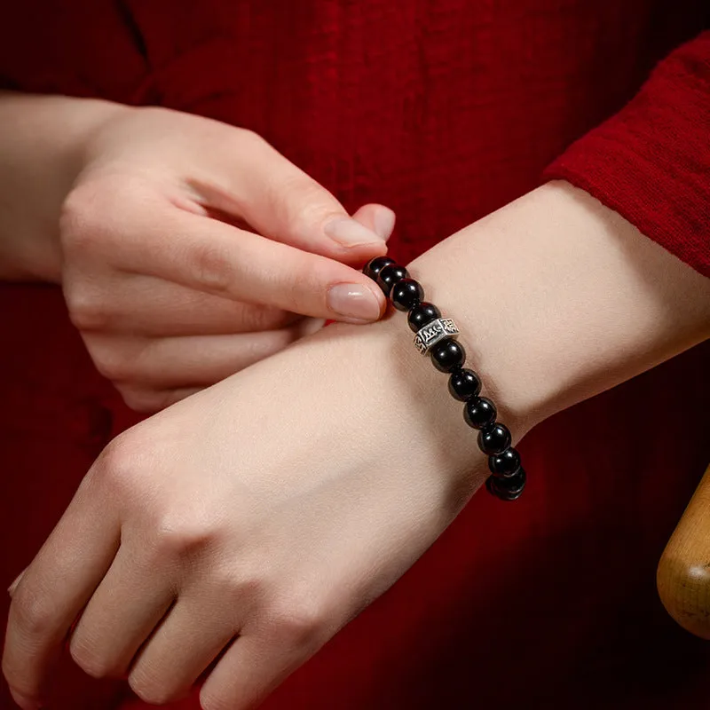 8mm obsidian zodiac bracelet with Buddhist statue beads and animal charms