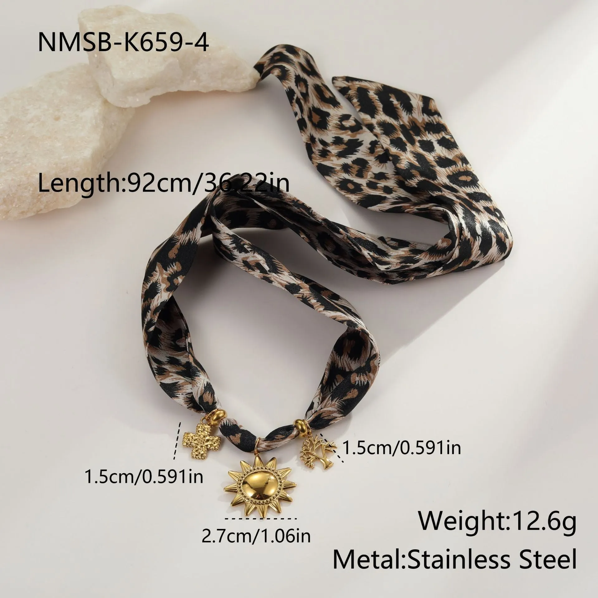Gold tone 18K electroplated stainless steel necklace with regular chain on white background