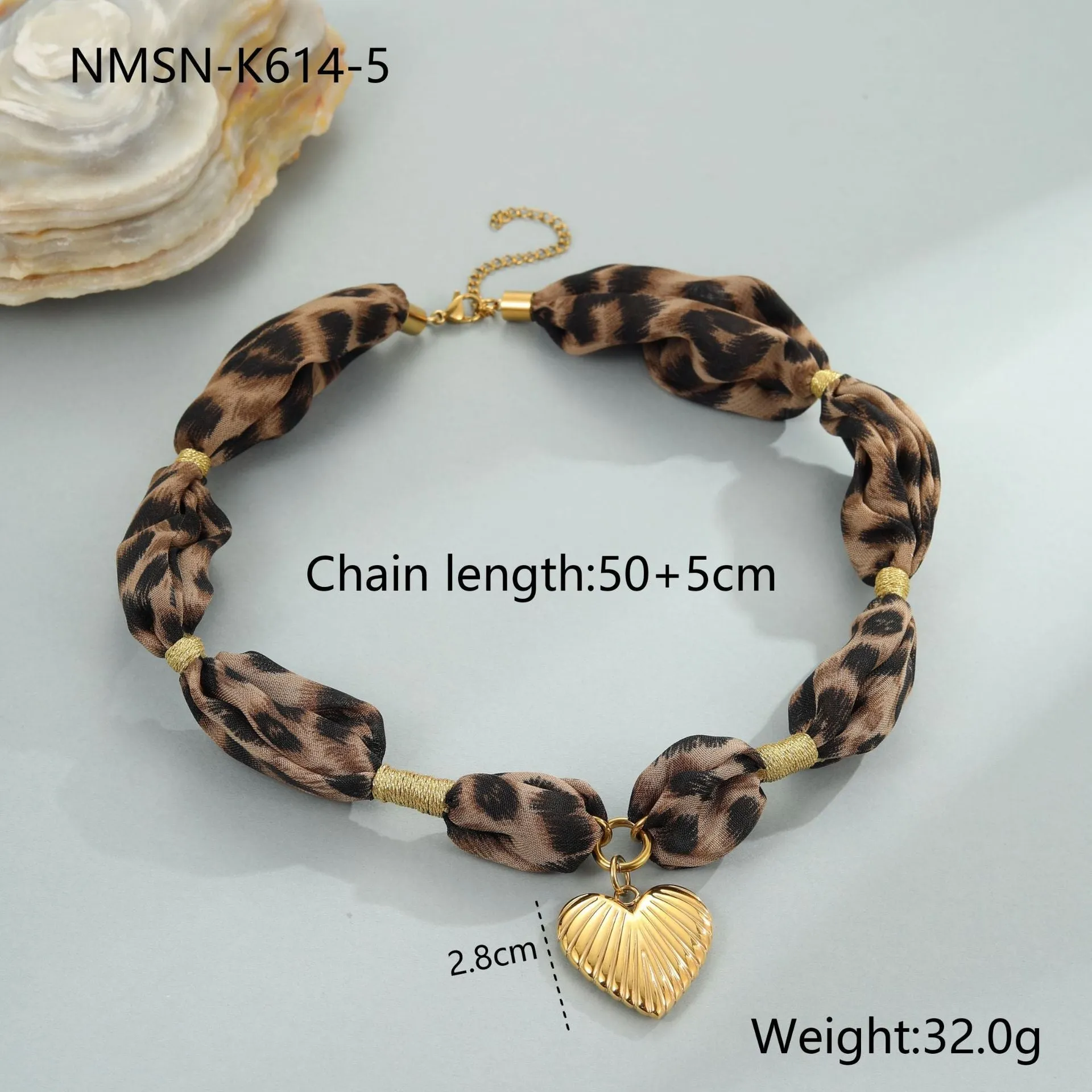 Gold tone 18K electroplated stainless steel necklace with regular chain on white background