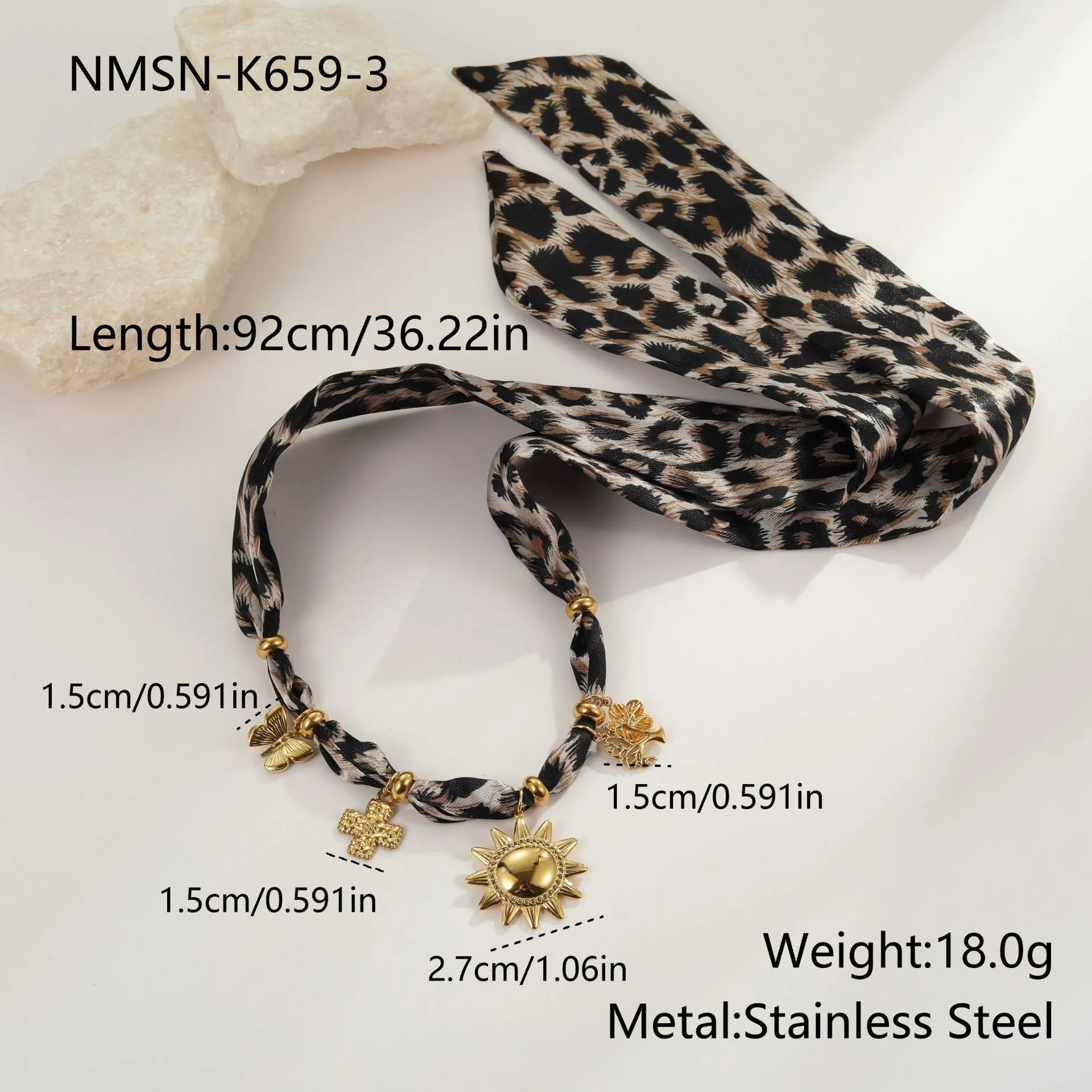 Gold tone 18K electroplated stainless steel necklace with regular chain on white background