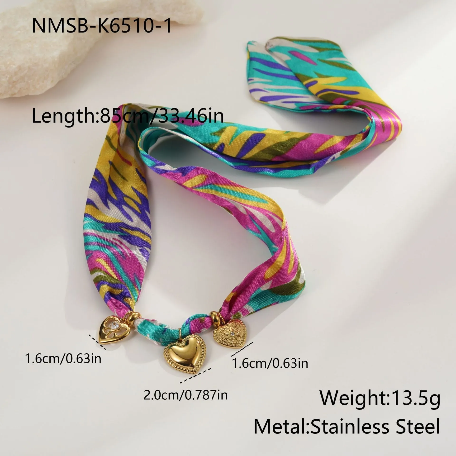 Gold tone 18K electroplated stainless steel necklace with regular chain on white background