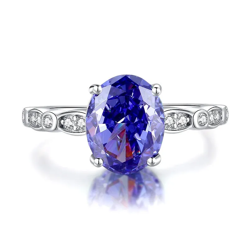 Sterling silver heart-shaped ring with a faceted colour zircon stone in a Tan Sang tone.