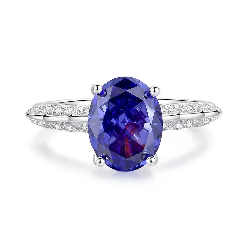 Sterling silver heart-shaped ring with a faceted colour zircon stone in a Tan Sang tone.