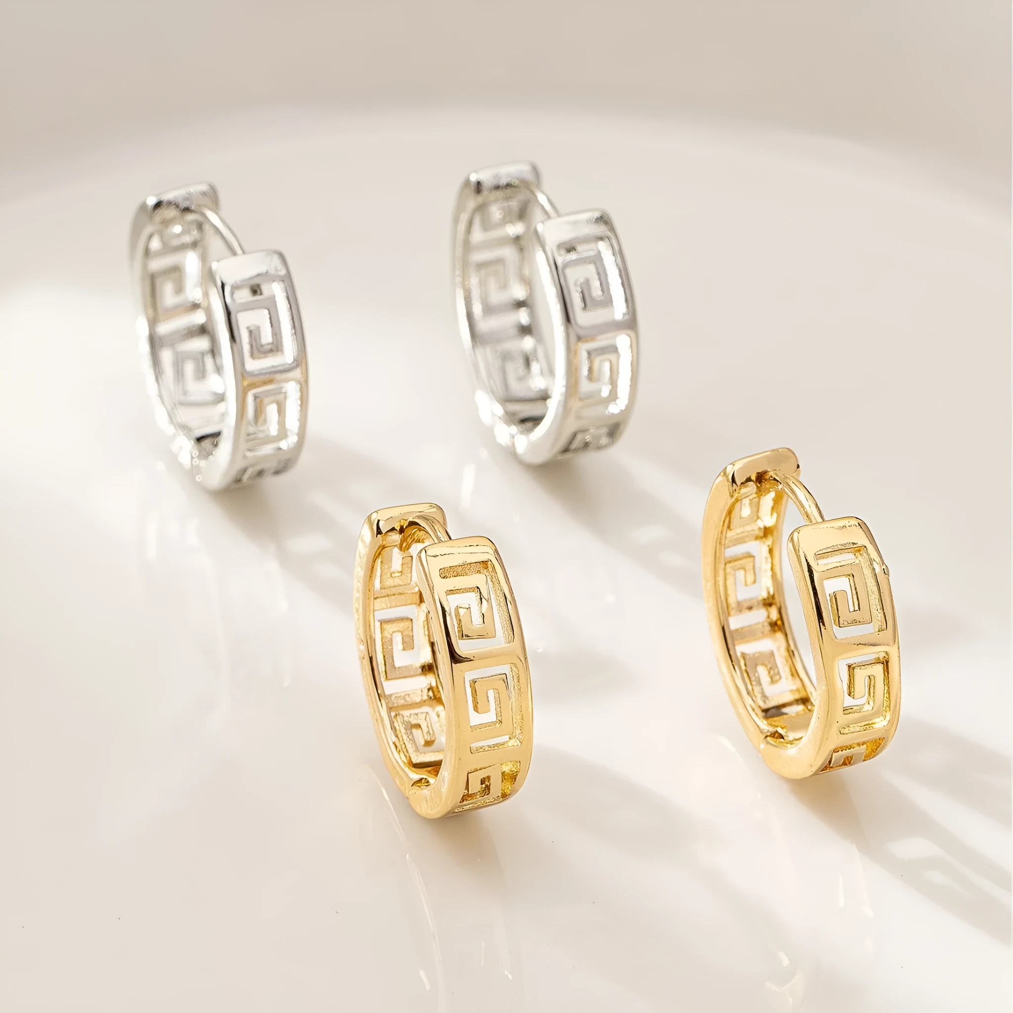 Retro ethnic style copper earrings with electroplated gold Great Wall pattern