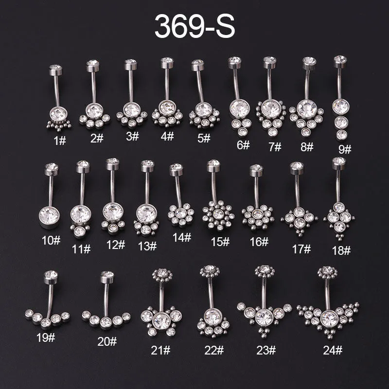 Gold stainless steel belly button ring with clear artificial gemstone inlay on white background