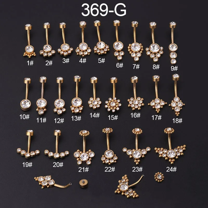 Gold stainless steel belly button ring with clear artificial gemstone inlay on white background
