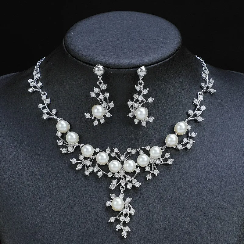 Women's fashion necklace and earrings set in gold or white with alloy construction and floral pattern