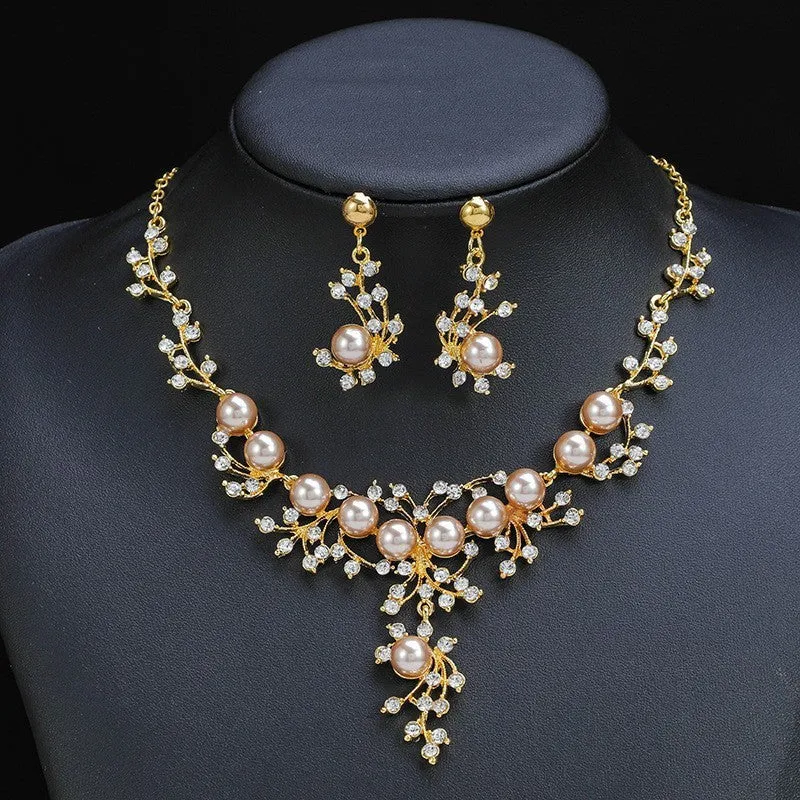 Women's fashion necklace and earrings set in gold or white with alloy construction and floral pattern