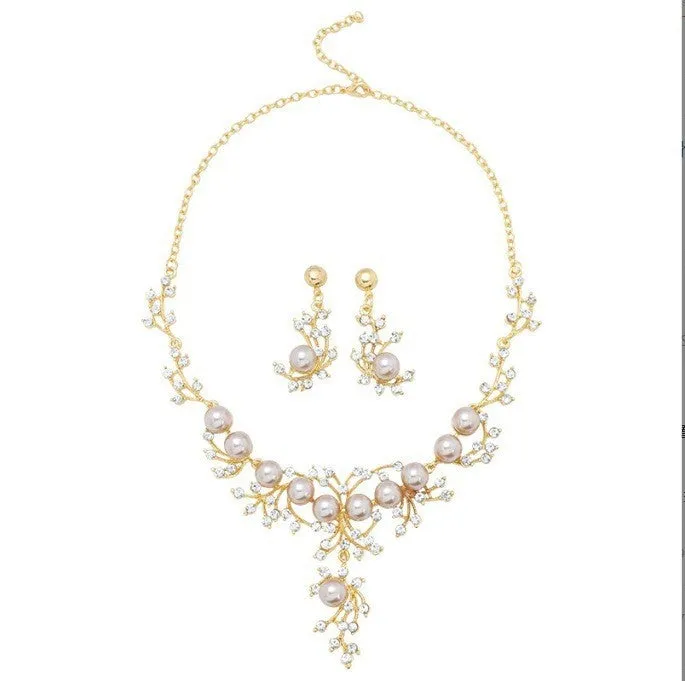 Women's fashion necklace and earrings set in gold or white with alloy construction and floral pattern