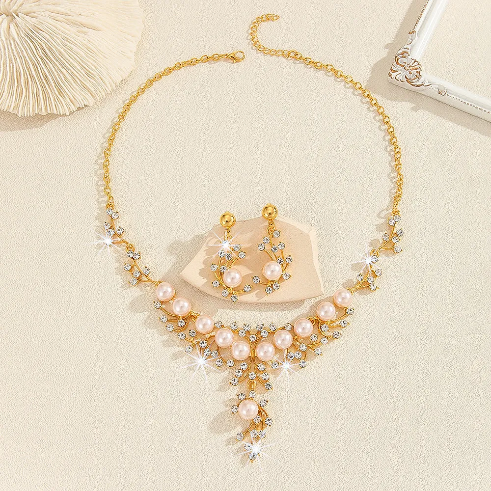 Women's fashion necklace and earrings set in gold or white with alloy construction and floral pattern