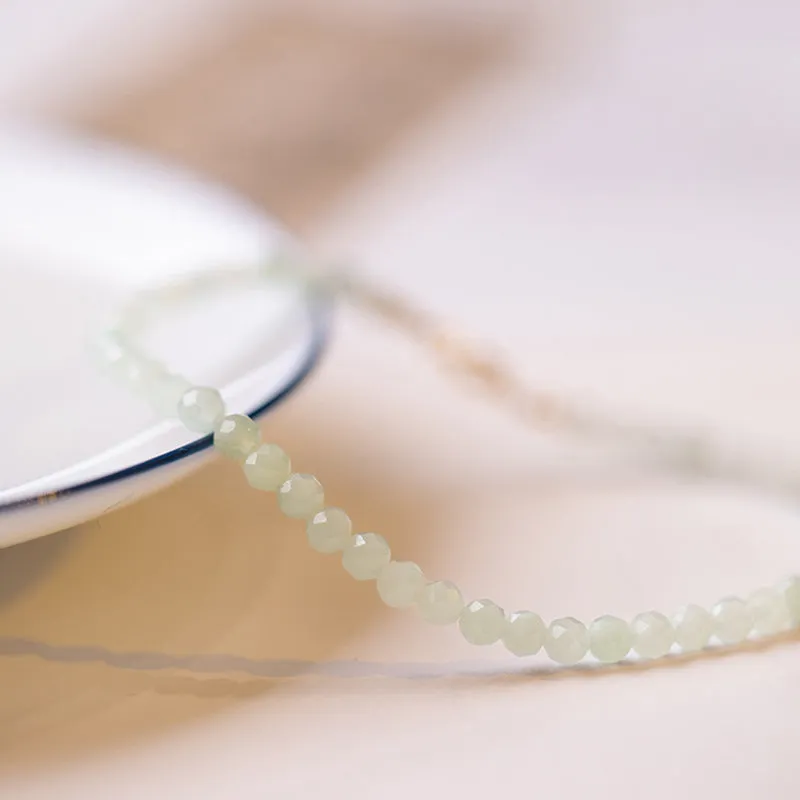 Women's Korean style retro bracelet with a jade ball charm on a chain.